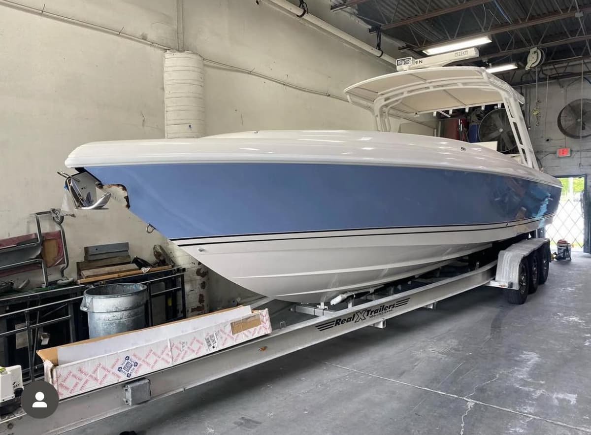 Before boat wrap - Sport Fishing Boat Wrap in Miami