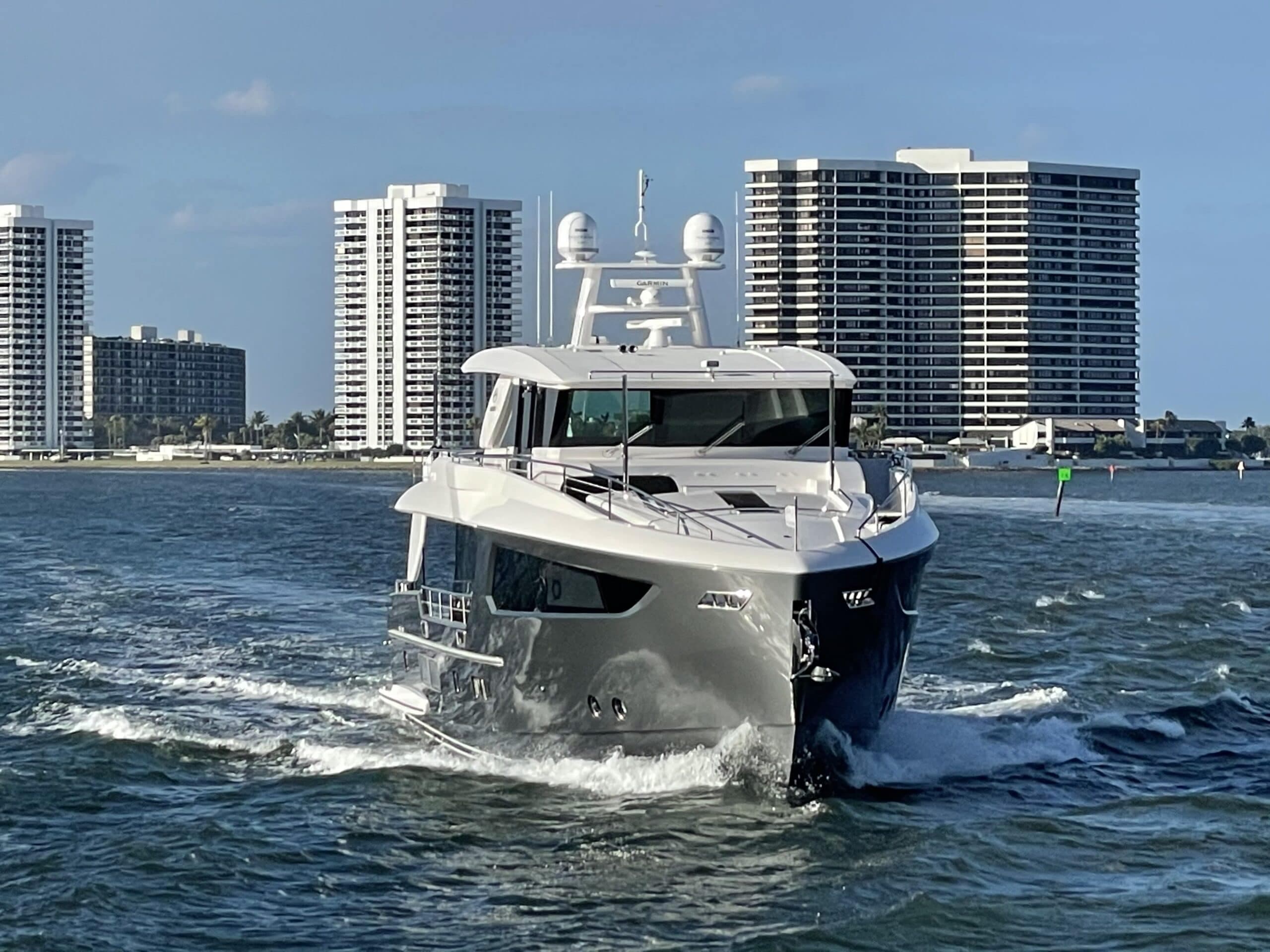 Custom sport fishing boat wrap in Miami with vibrant blue design