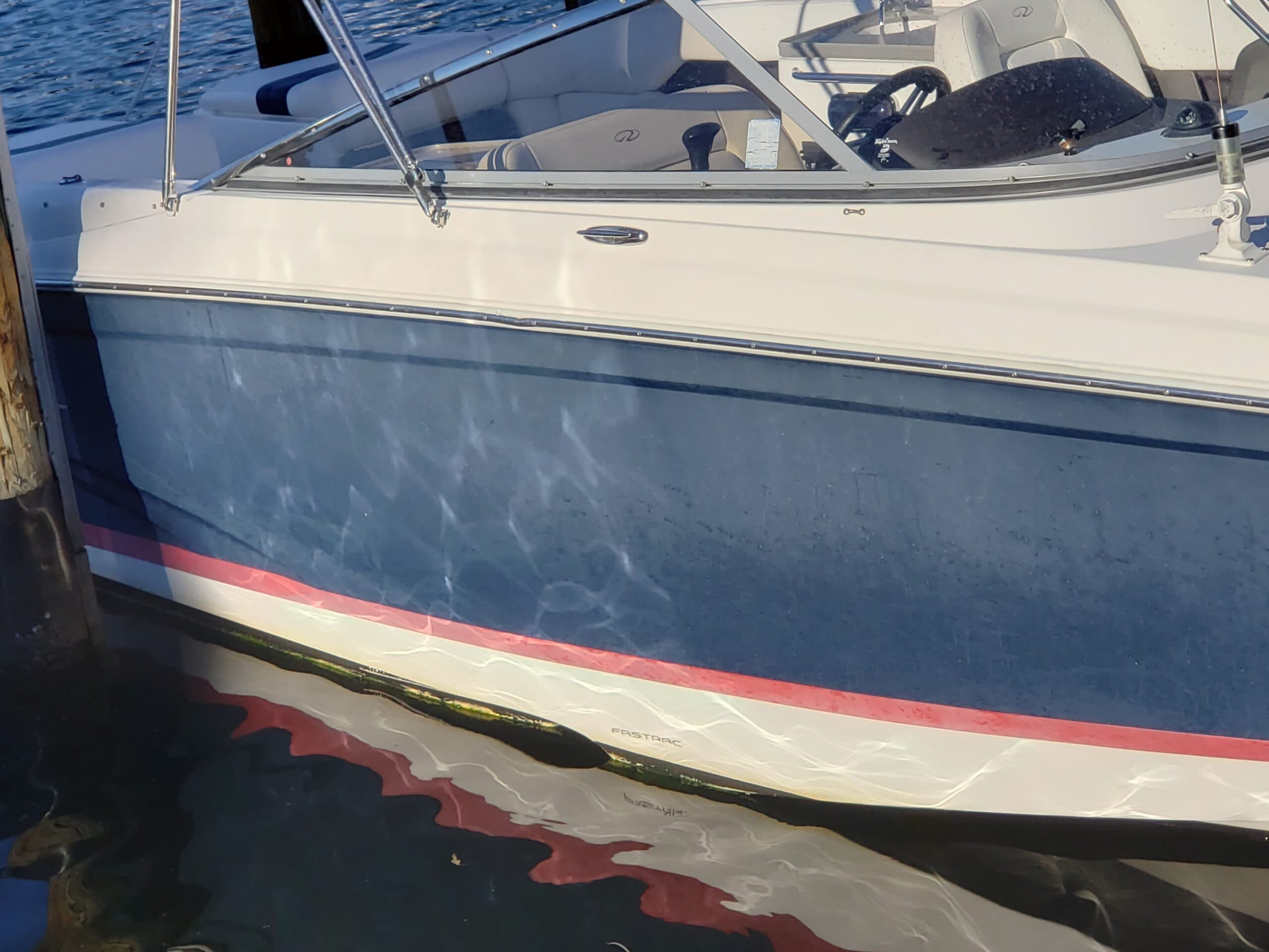 Boat wrap installation in West Palm Beach protecting center console